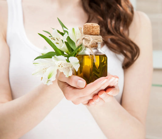 Lady holding canola oil bottle