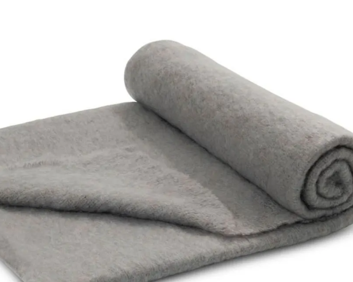 Grey Ingubo wool blanket rolled up
