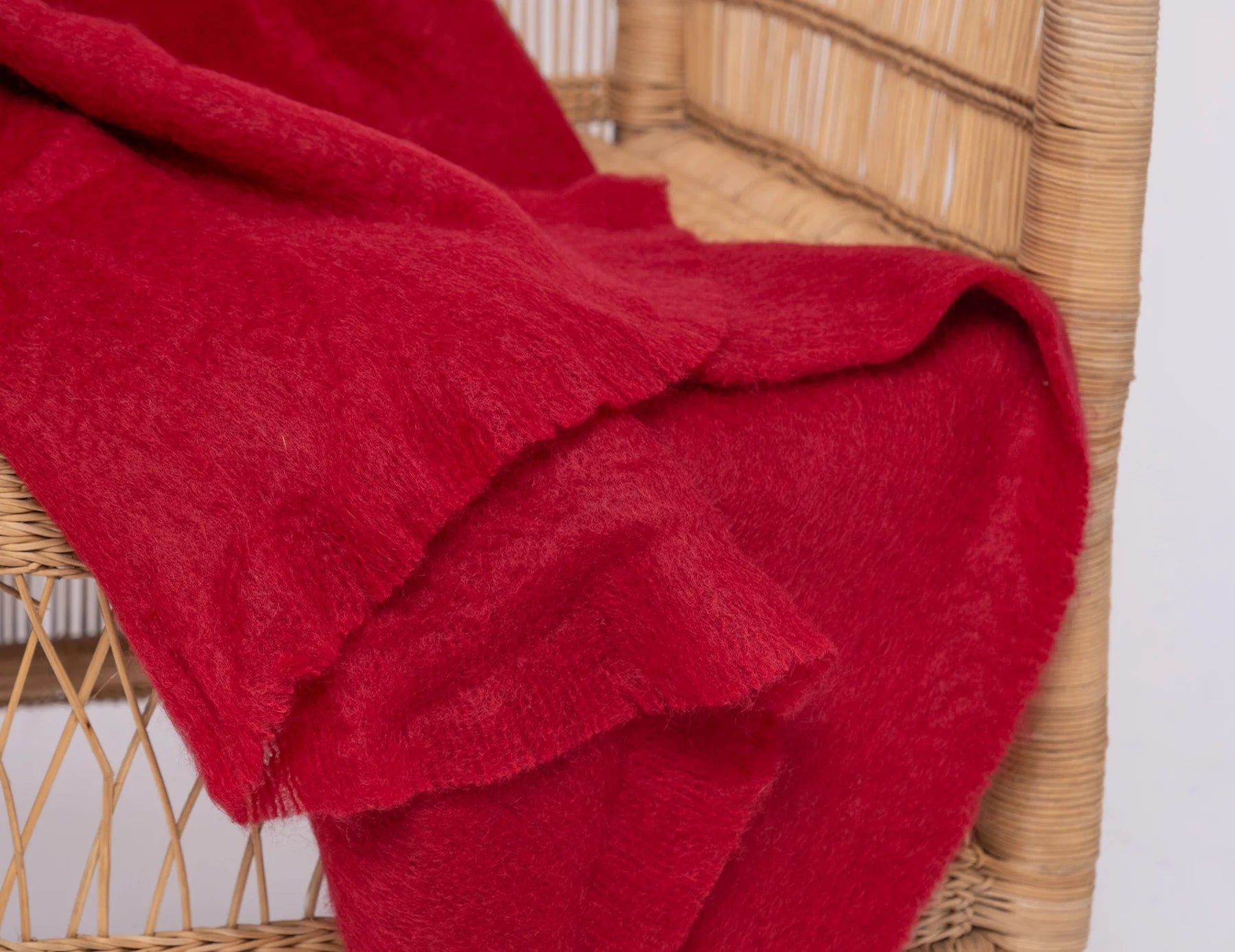 Ingubo Merlot blanket on a chair