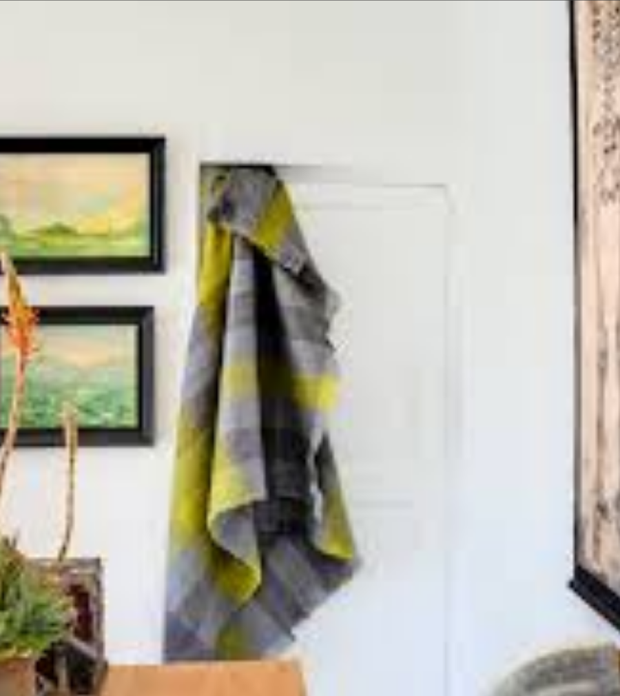 Ingubo Moorlands blanket hanging on a door